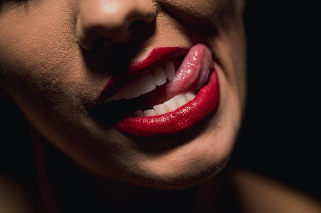 Close up of a woman licking her lips